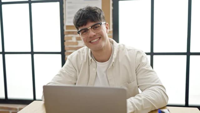 young man worker using laptop